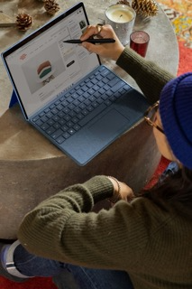 Source Code Academia team member working in a collaborative environment